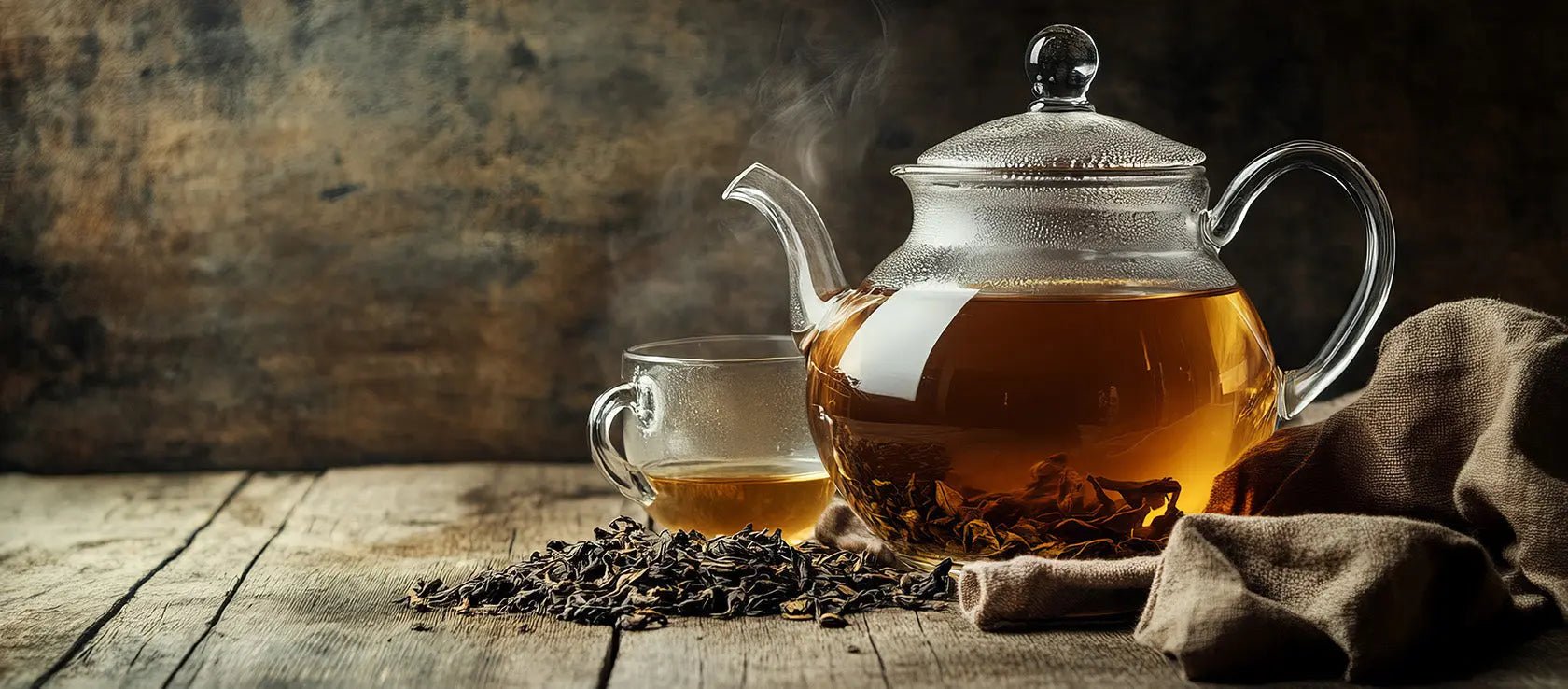 Teapot and cup of raspberry leaf tea – calming herbal infusion for pregnancy support