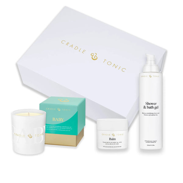 New Mum Gift Set | Natural Skincare and Candle Gift featuring shower gel, balm, baby cream, and a scented candle in a luxury white box. Ideal for postnatal care and gifting.