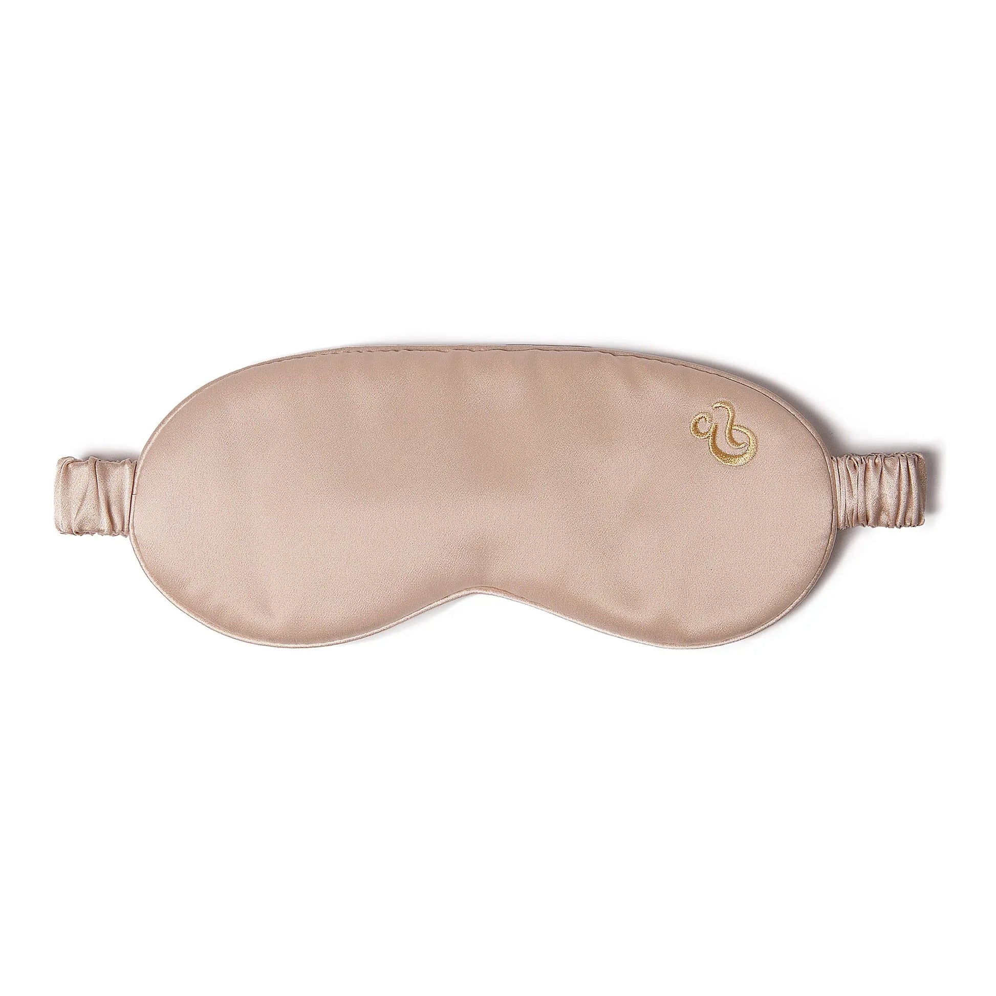 Luxury Sleep Mask - Cradle & Tonic made from 100% mulberry silk in a soft beige tone with elastic strap, ideal for pregnancy sleep support.