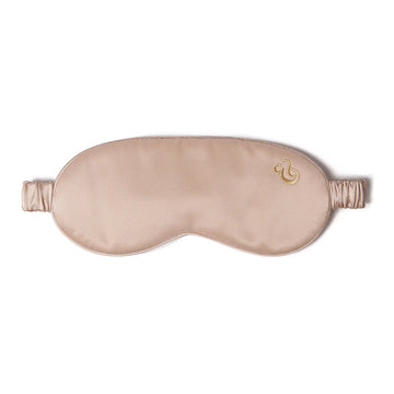 Luxury Sleep Mask - Cradle & Tonic made from 100% mulberry silk in a soft beige tone with elastic strap, ideal for pregnancy sleep support.