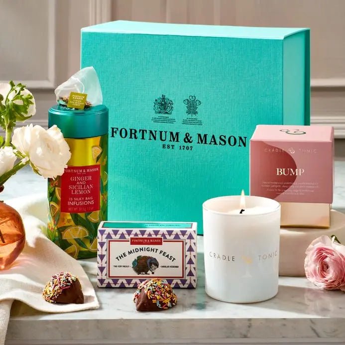 Cradle & Tonic Pregnancy Candle featured in a Fortnum & Mason gift set, perfect for gifting natural and safe home fragrances to expectant mothers.