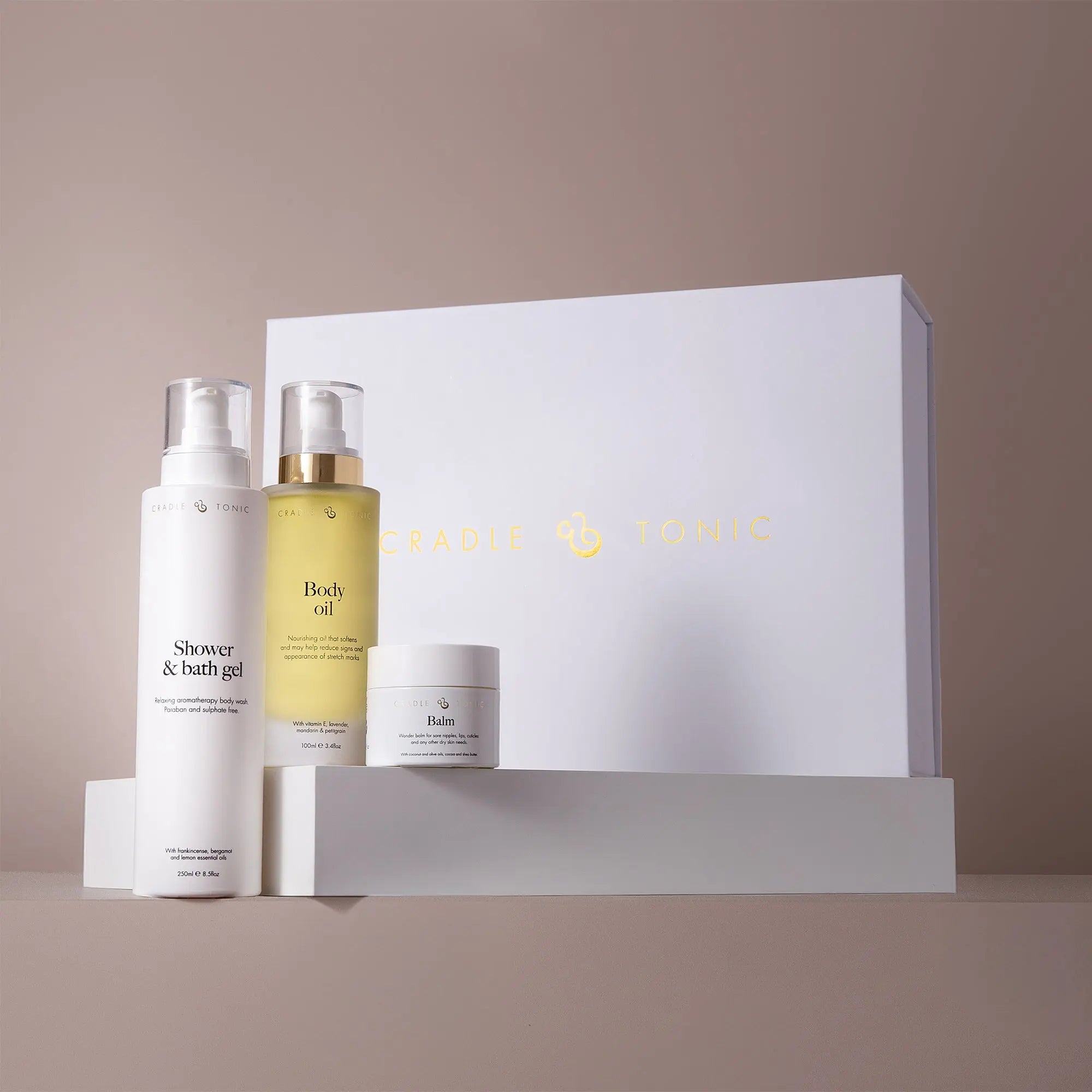 Pregnancy Skincare Gift Set | Natural Essentials for Mum-to-Be featuring shower gel, body oil, and balm in elegant packaging. Ideal for sensitive skin care.