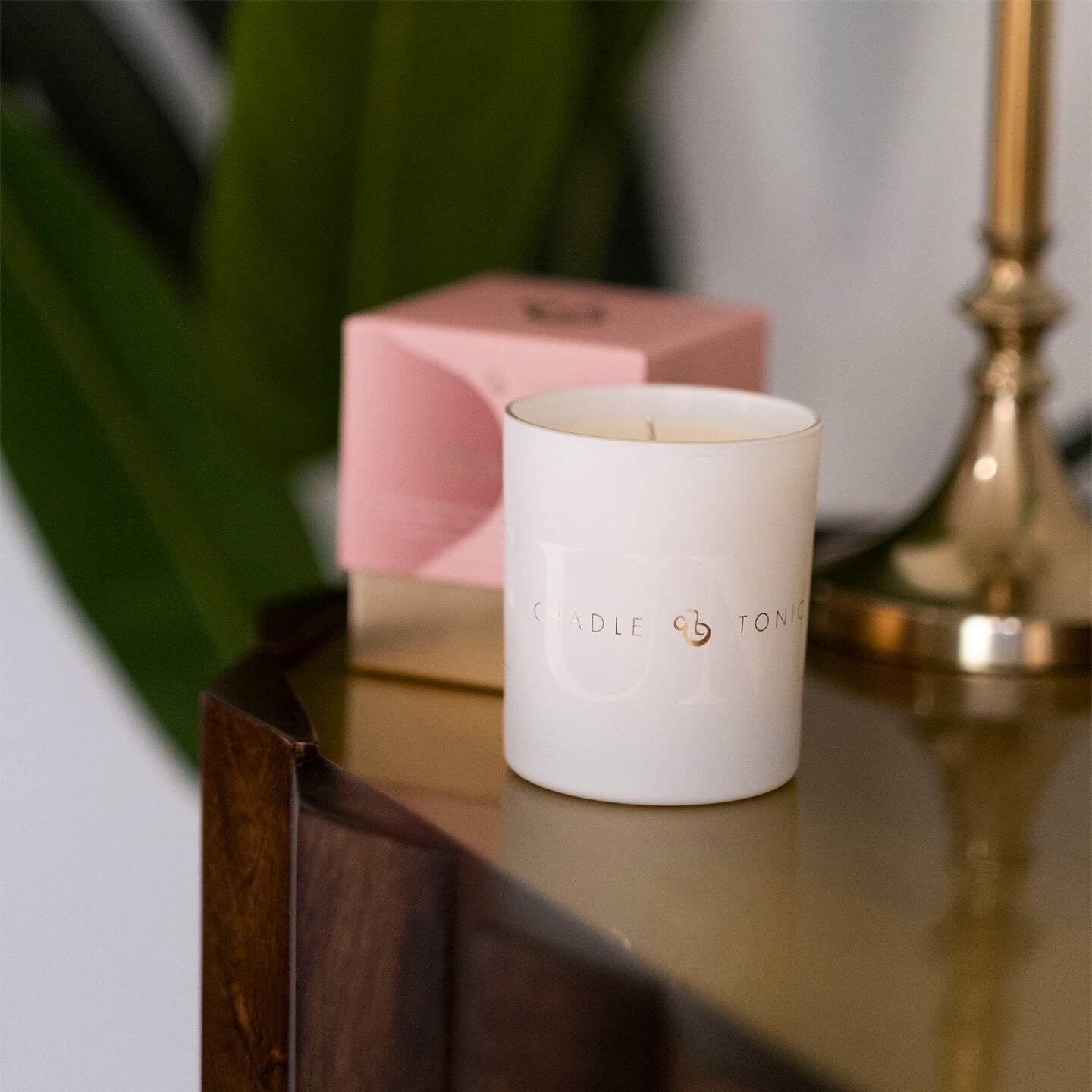 Soothing pregnancy candle in a living room setting – ideal for home relaxation and self-care